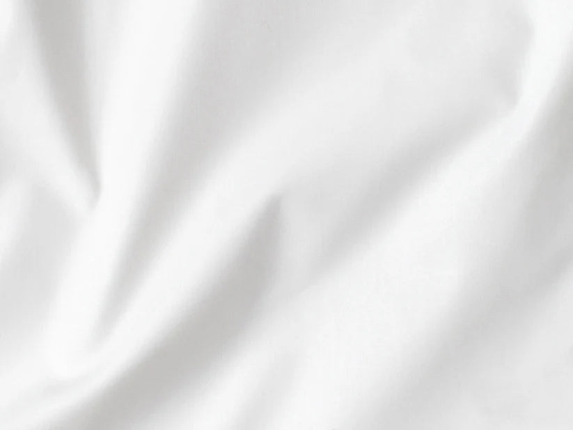 Closeup of cotton percale sheet in Alpine White.