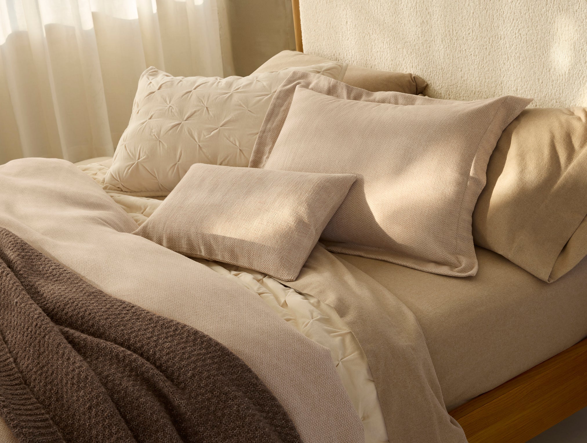 Coyuchi Cloud Brushed Organic Flannel Texture Duvet Cover - staged bed #colour_camel heather