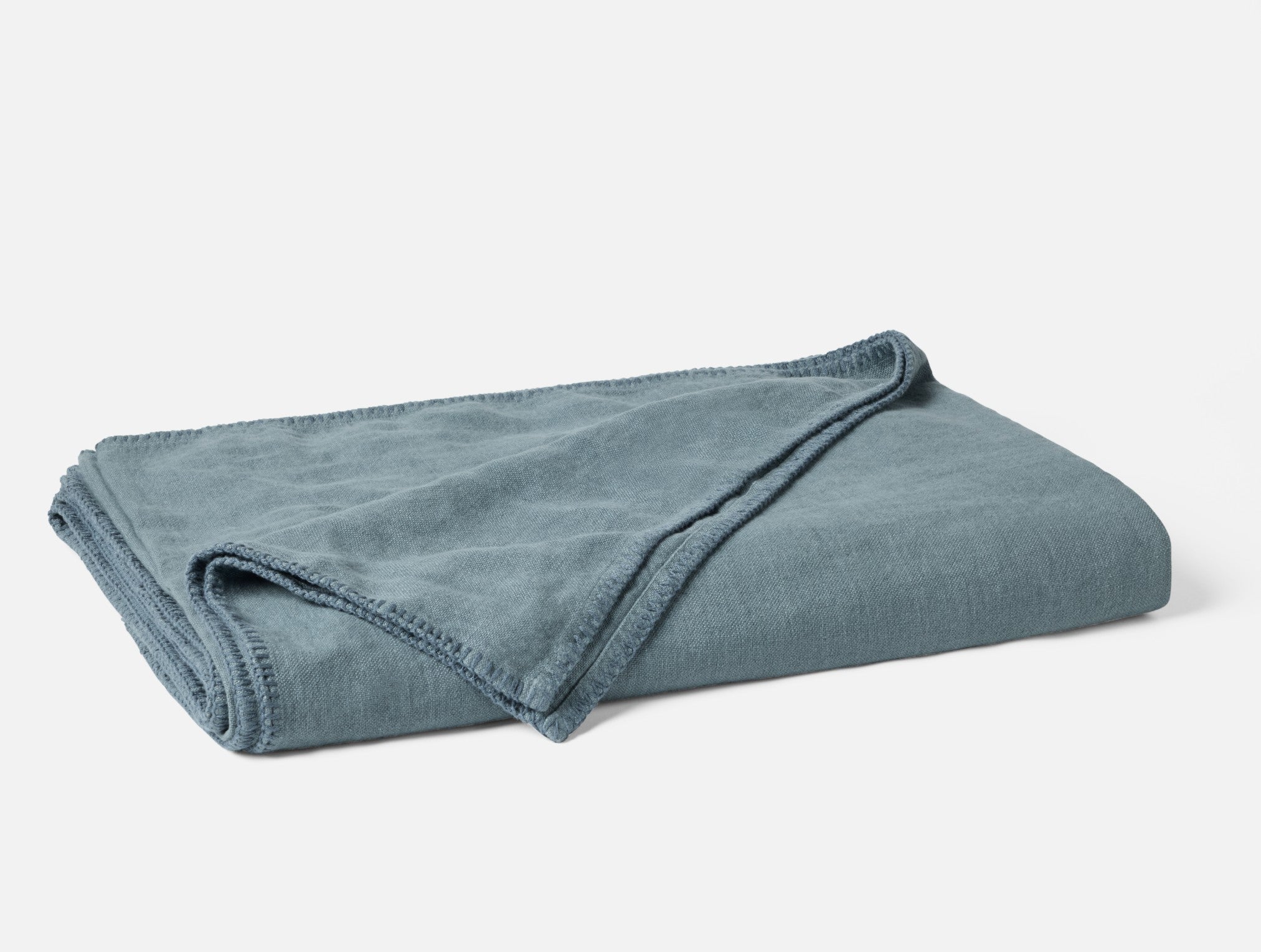 Coyuchi Helena Organic Linen Blanket - folded #colour_river
