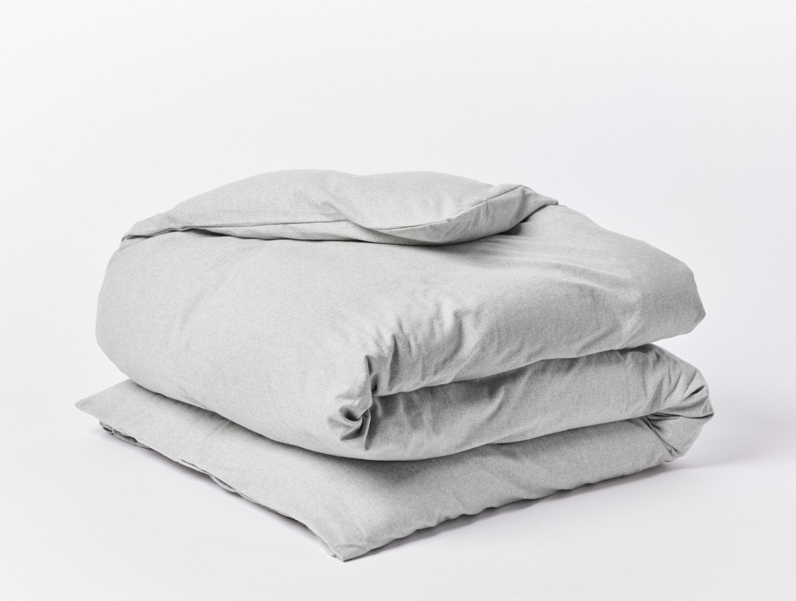 Coyuchi Organic Cloud Brushed Flannel Duvet Cover - folded white background #colour_pale gray heather