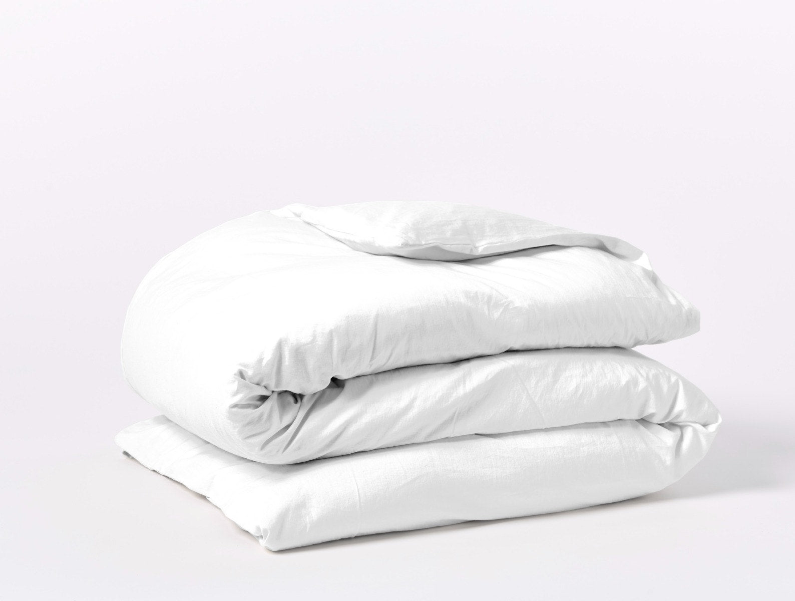 Coyuchi Organic Cloud Soft Sateen Duvet Cover - folded #colour_alpine white