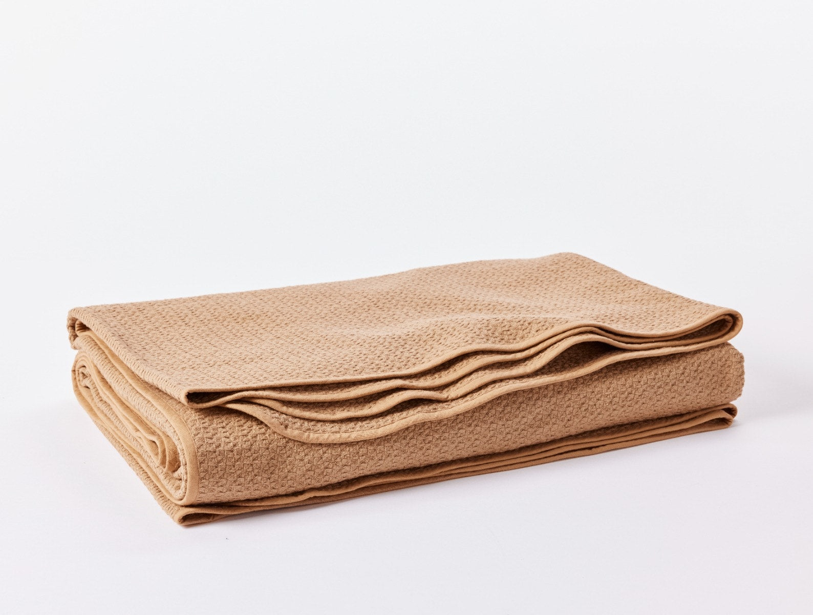 Coyuchi Organic Cotton Honeycomb Blanket - folded #colour_Ginger