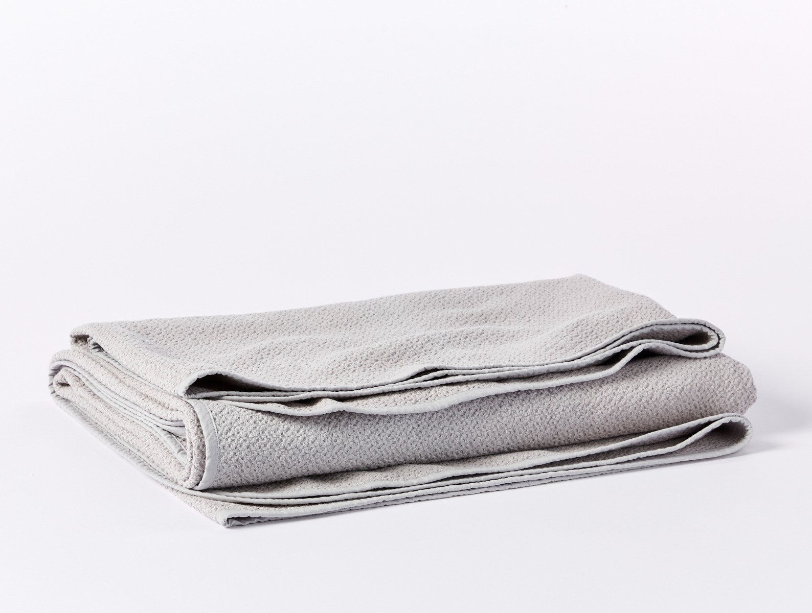 Coyuchi Organic Cotton Honeycomb Blanket - folded #colour_pewter