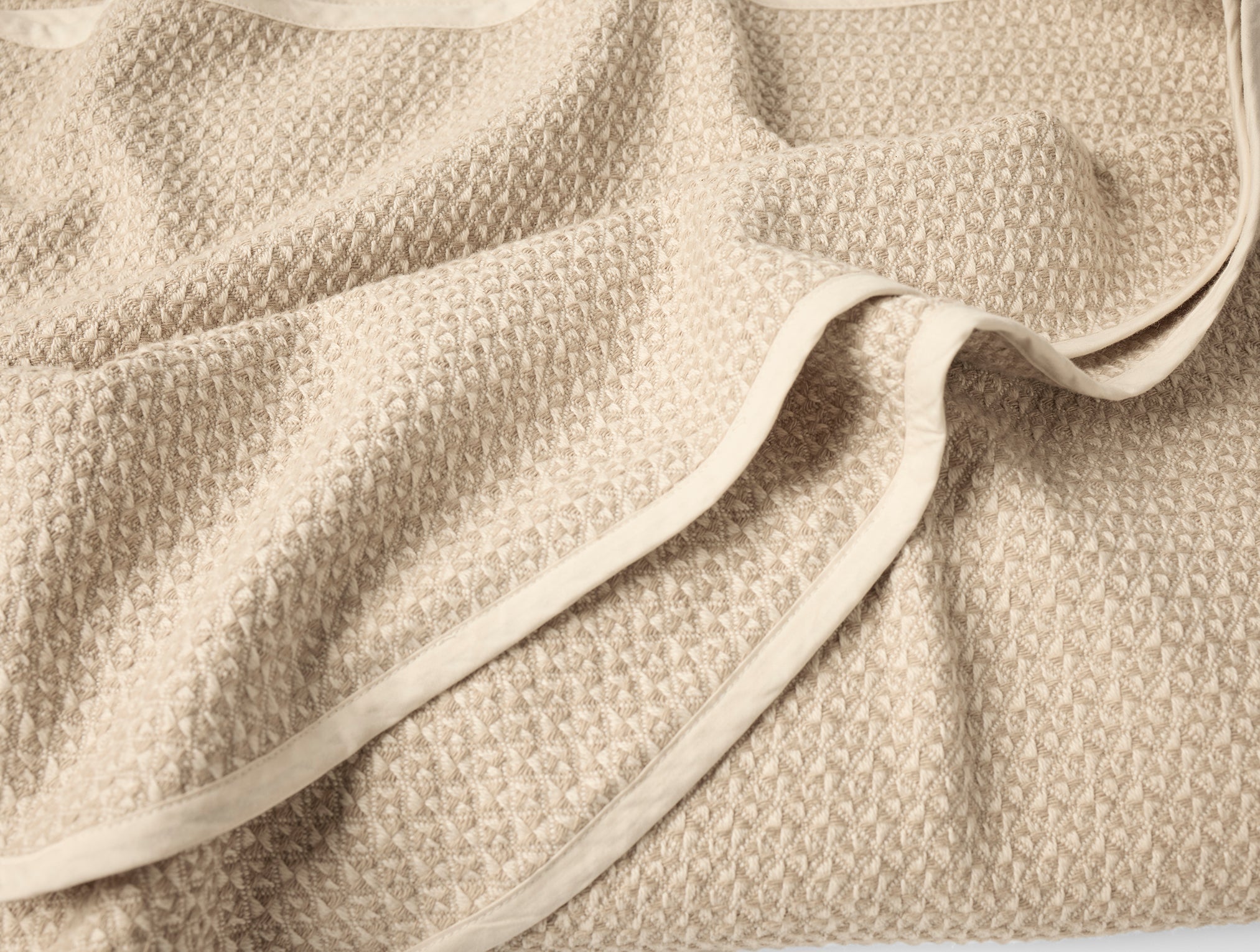 Coyuchi Organic Cotton Honeycomb Blanket - close up of edge and texture #colour_Undyed Oyster