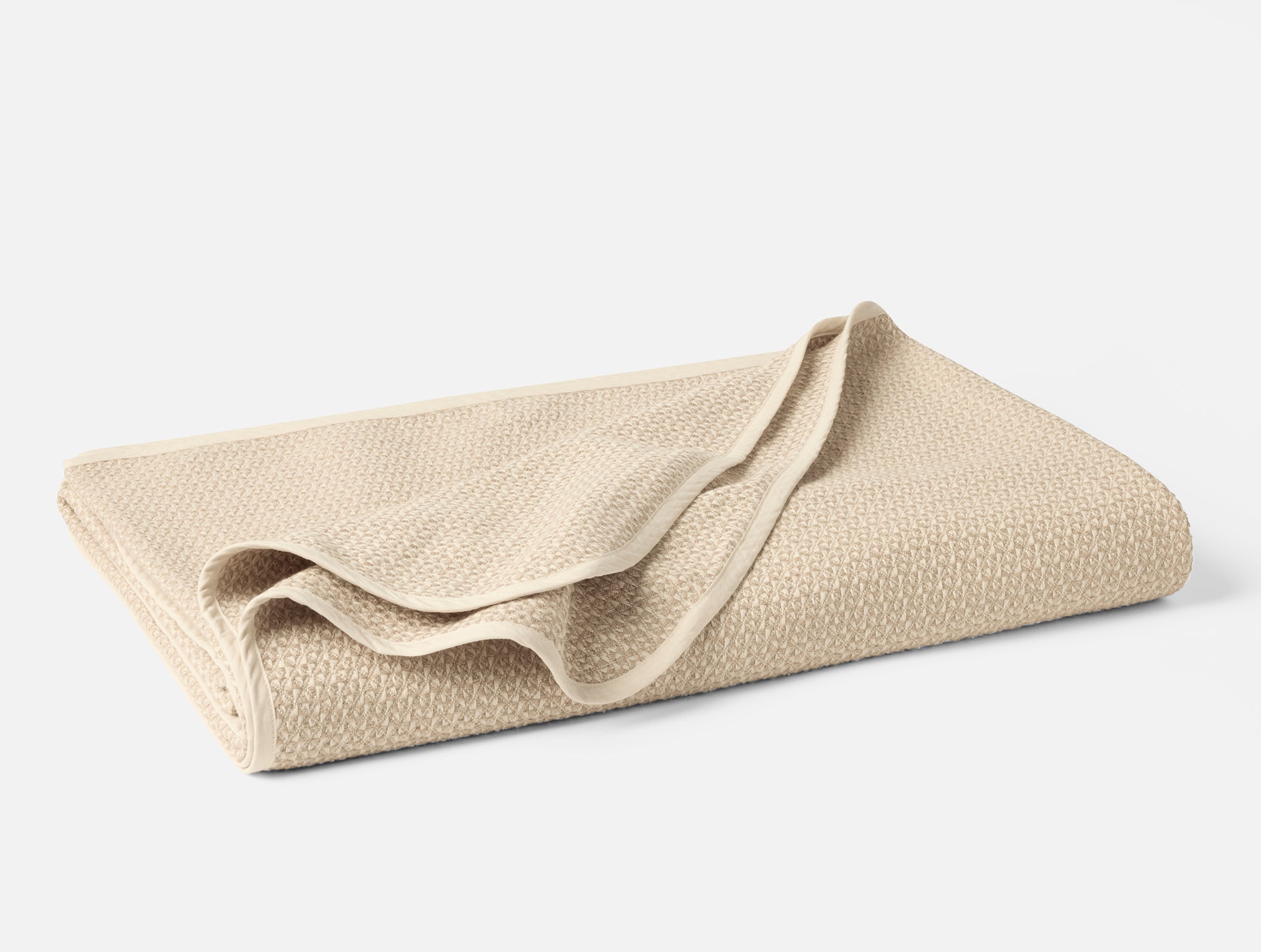 Coyuchi Organic Cotton Honeycomb Blanket - folded #colour_Undyed Oyster