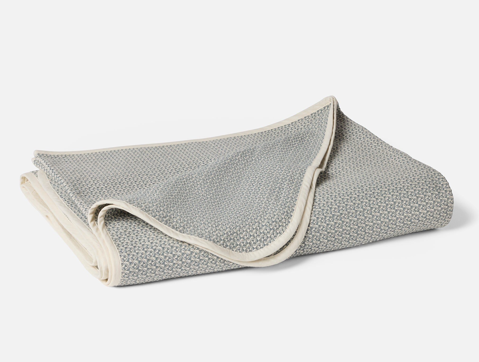 Coyuchi Organic Cotton Honeycomb Blanket - folded #colour_Undyed Lagoon
