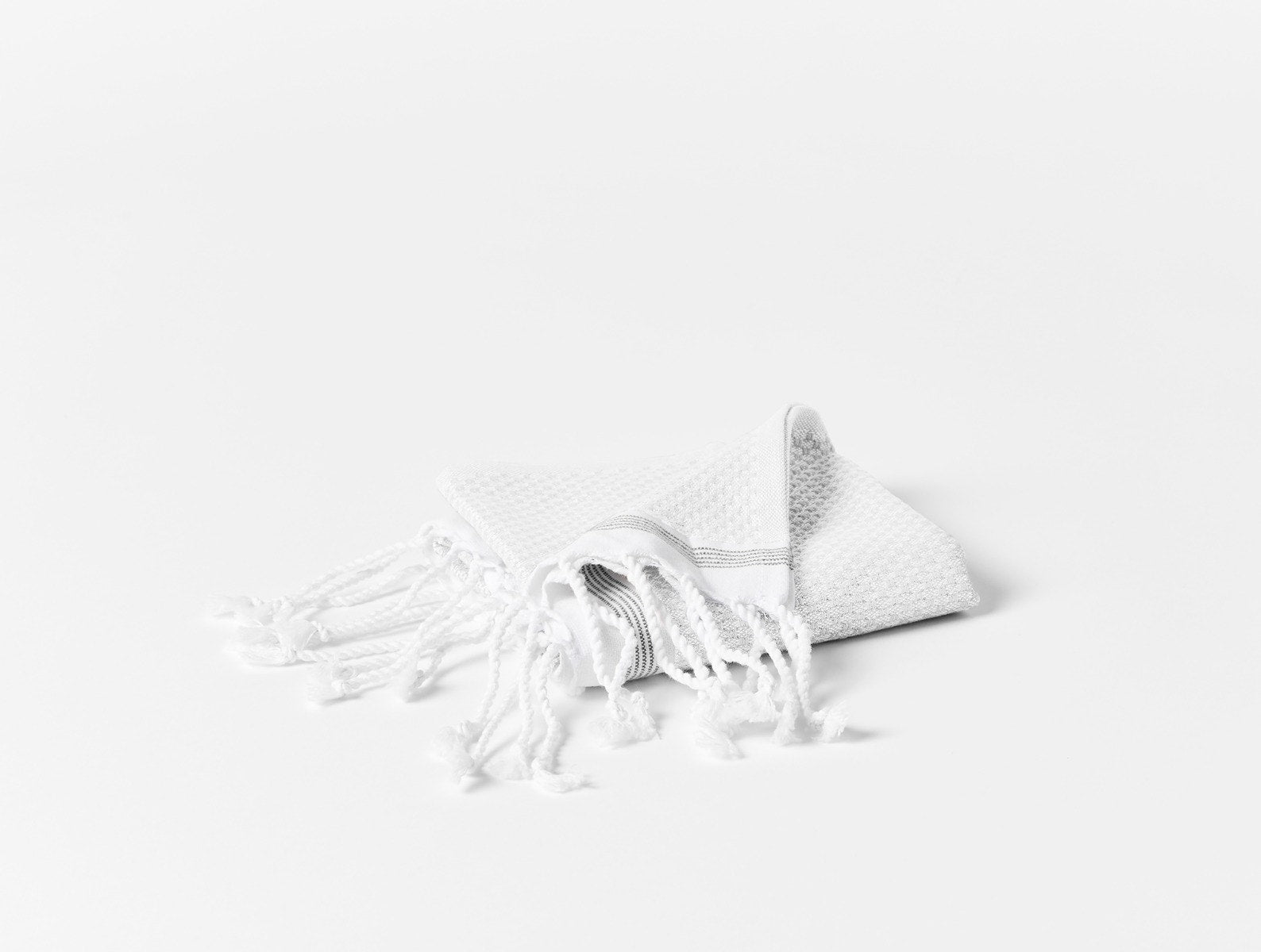 Coyuchi Organic Cotton Mediterranean Hand Towel - folded #colour_Alpine White w/ Slate Stripes