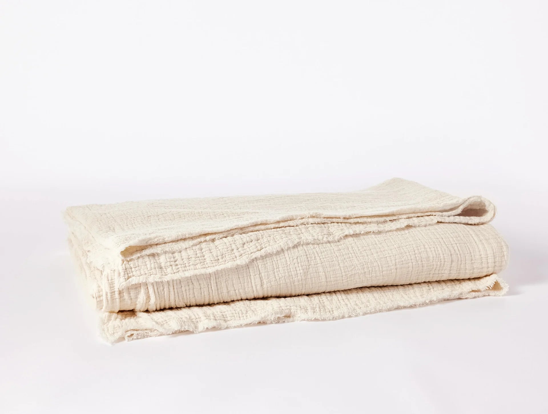 Coyuchi Organic Cotton Topanga Matelasse Blanket - folded #colour_Undyed