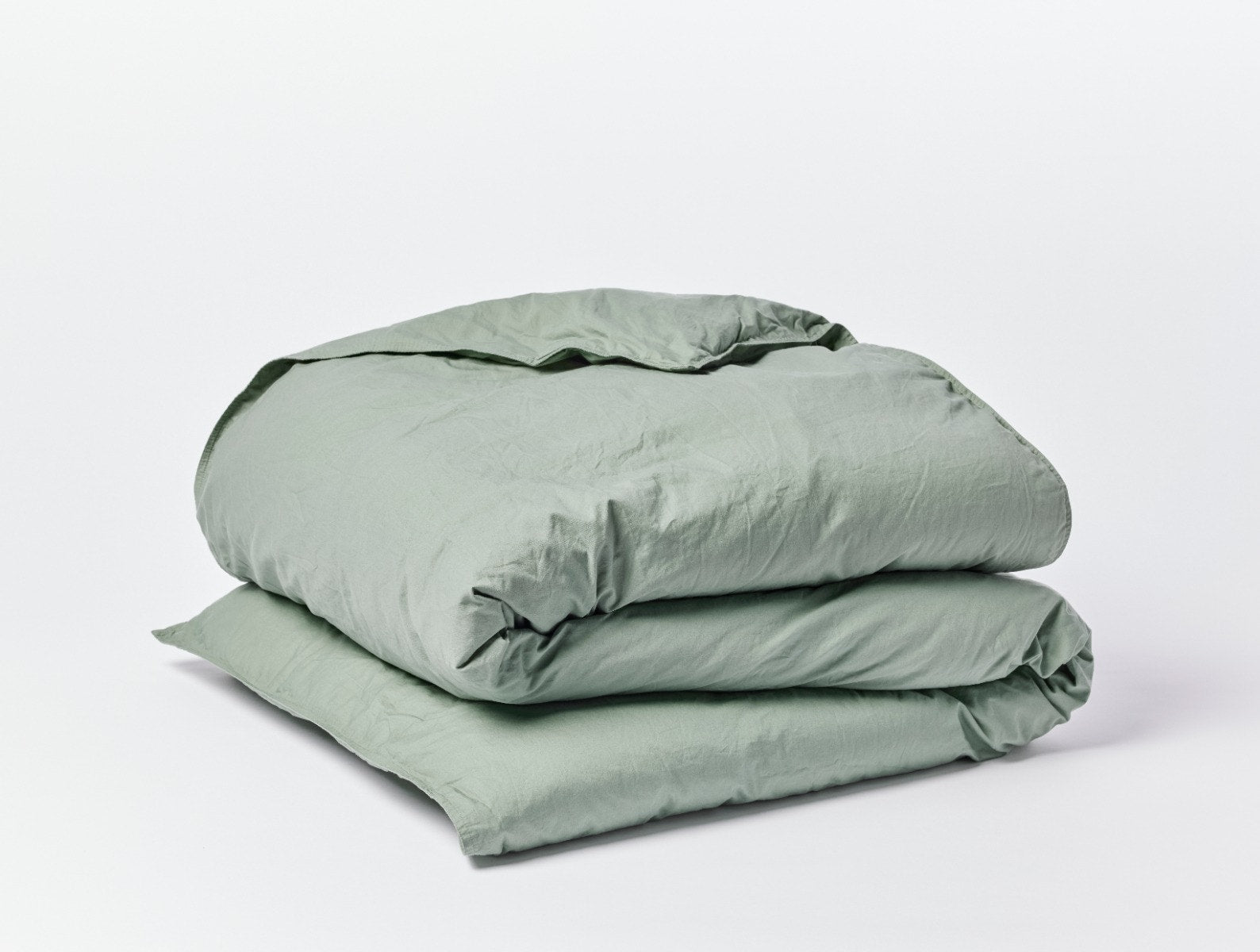 Coyuchi Organic Crinkled Percale Duvet Cover - folded #colour_sage