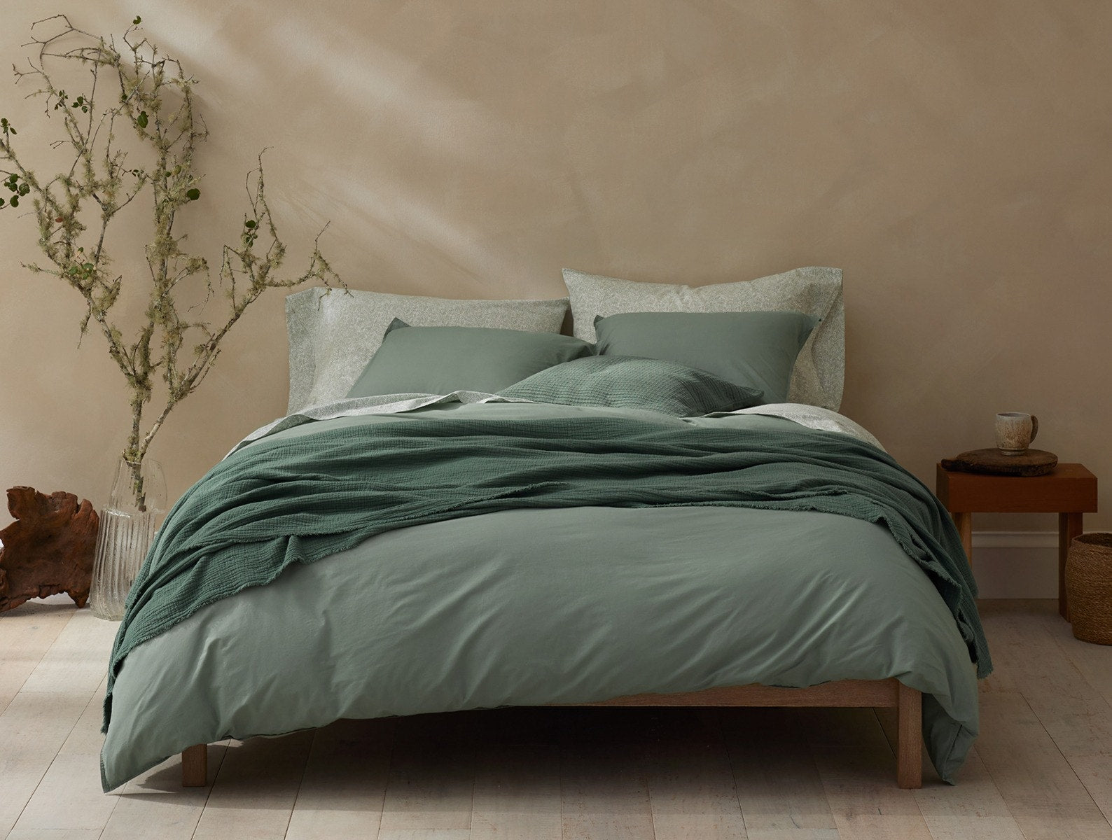 Coyuchi Organic Crinkled Percale Duvet Cover - staged bed #colour_Sage