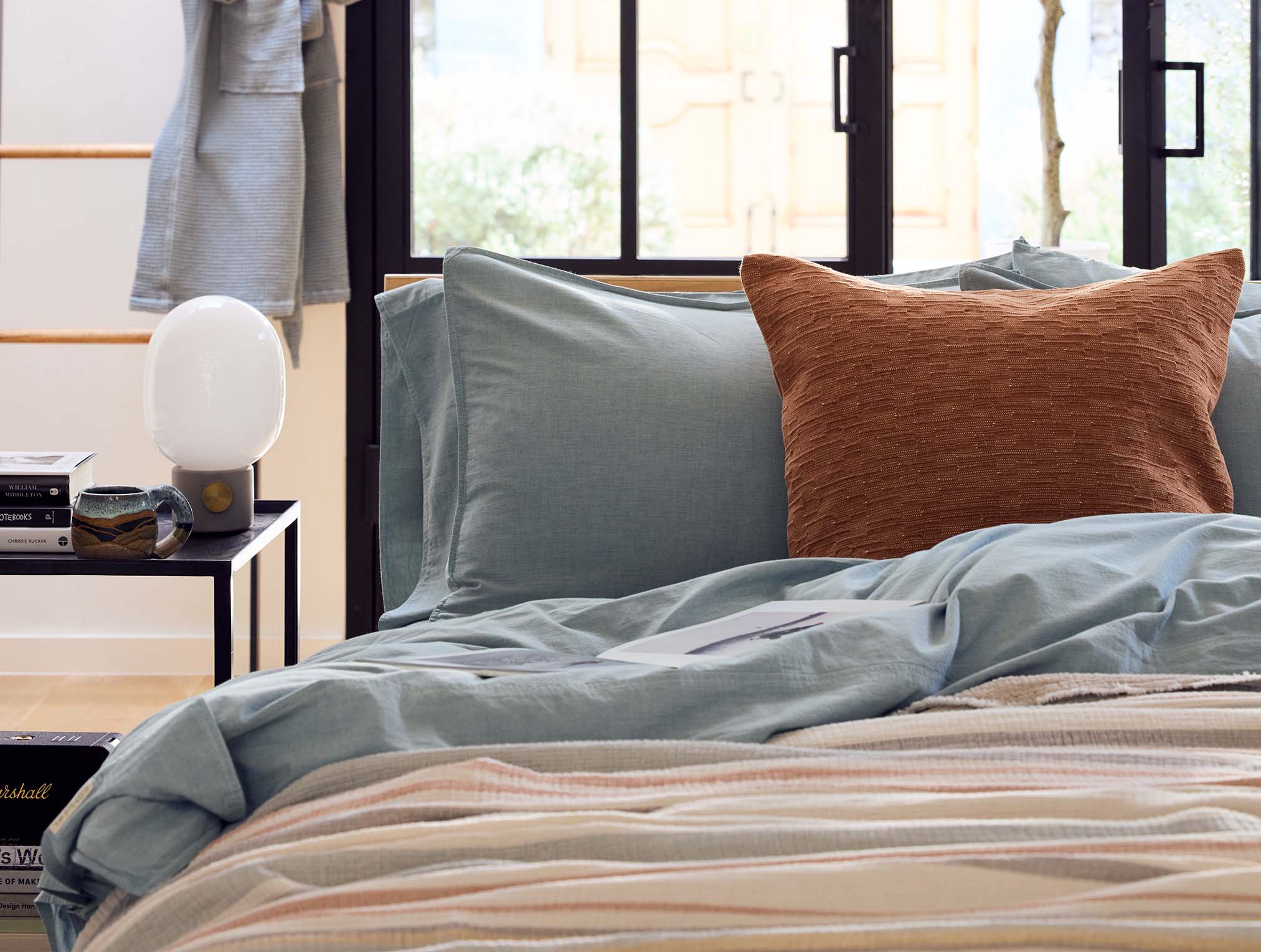 Coyuchi Organic Crinkled Percale Duvet Cover - staged bed #colour_Surf Chambray