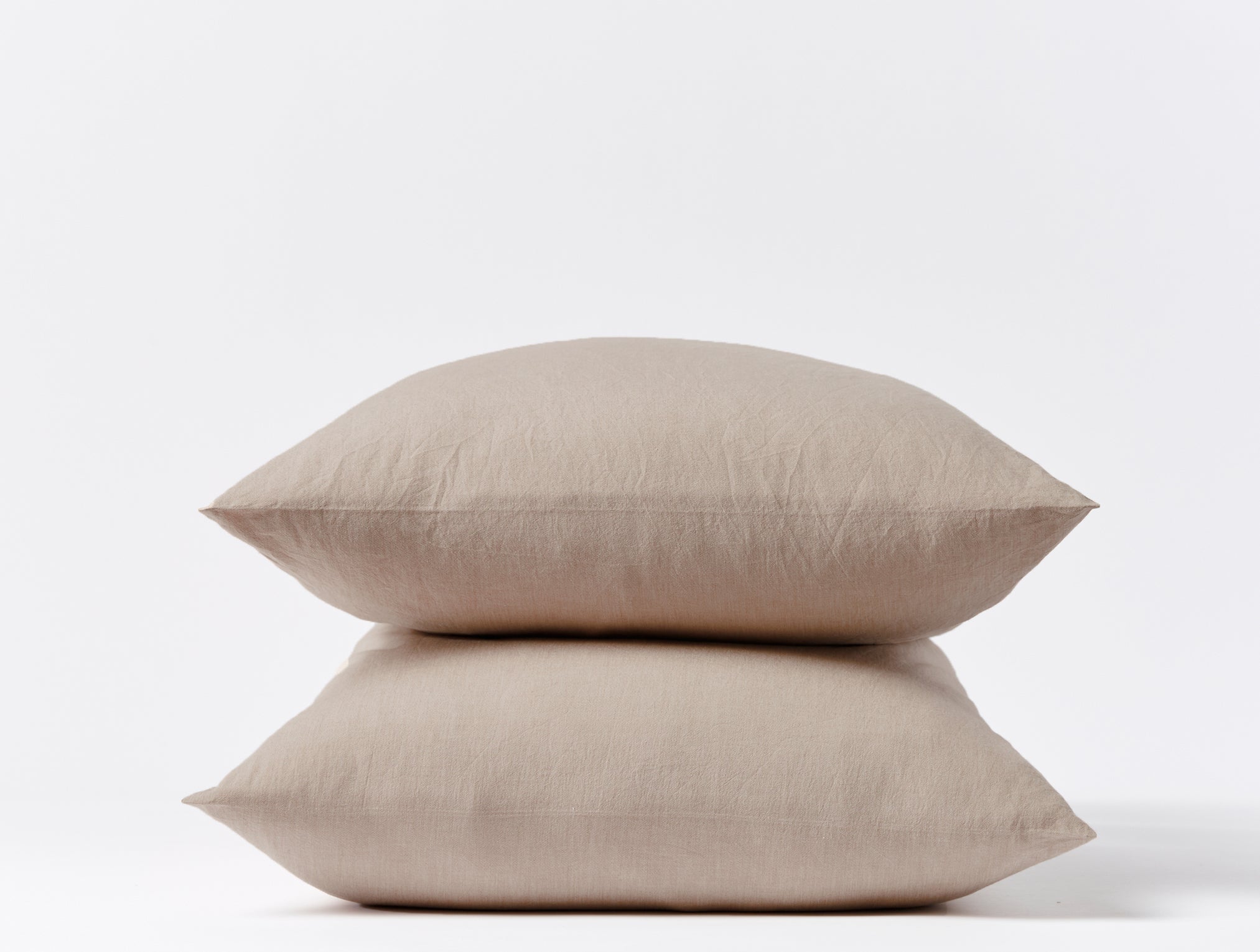Coyuchi Crinkled Percale Pillowcase -stacked with white background #colour_hazel chambray