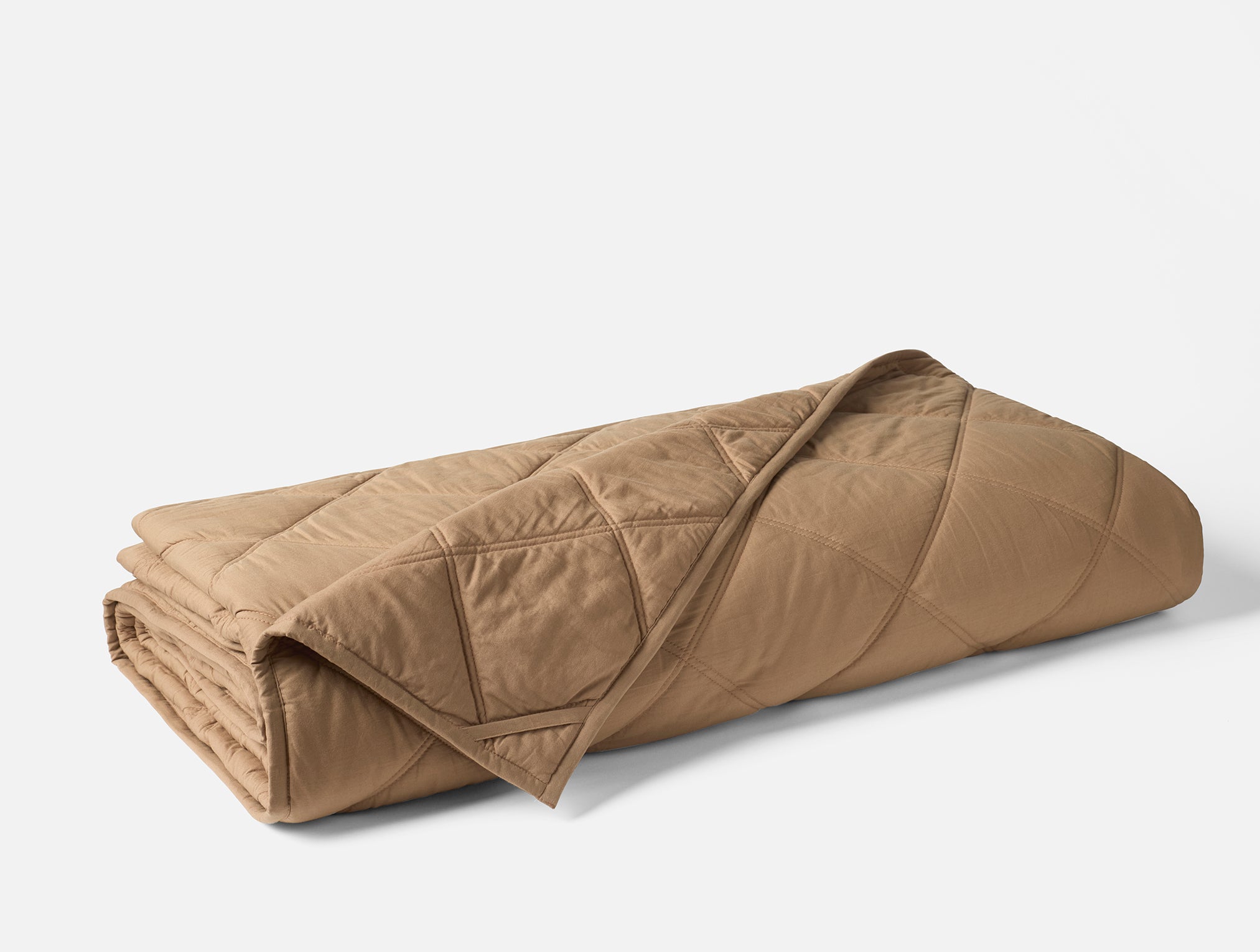Coyuchi Organic Diamond Stitched Comforter - folded #colour_Doe