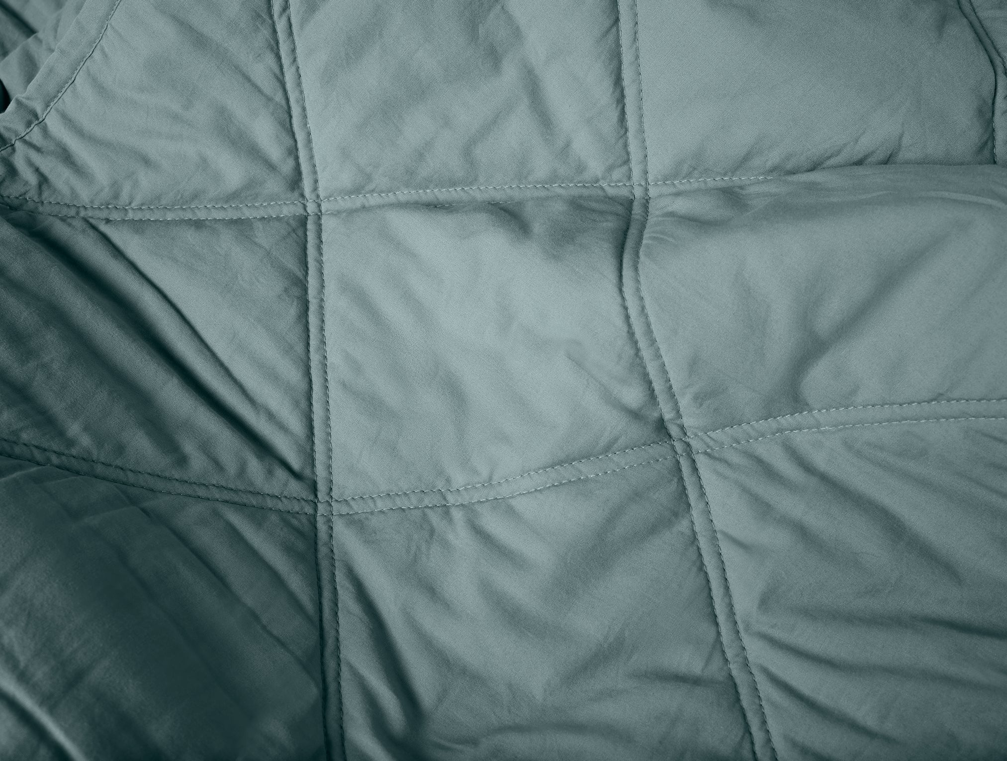 Coyuchi Organic Diamond Stitched Comforter - close up showing stitching #colour_Lagoon