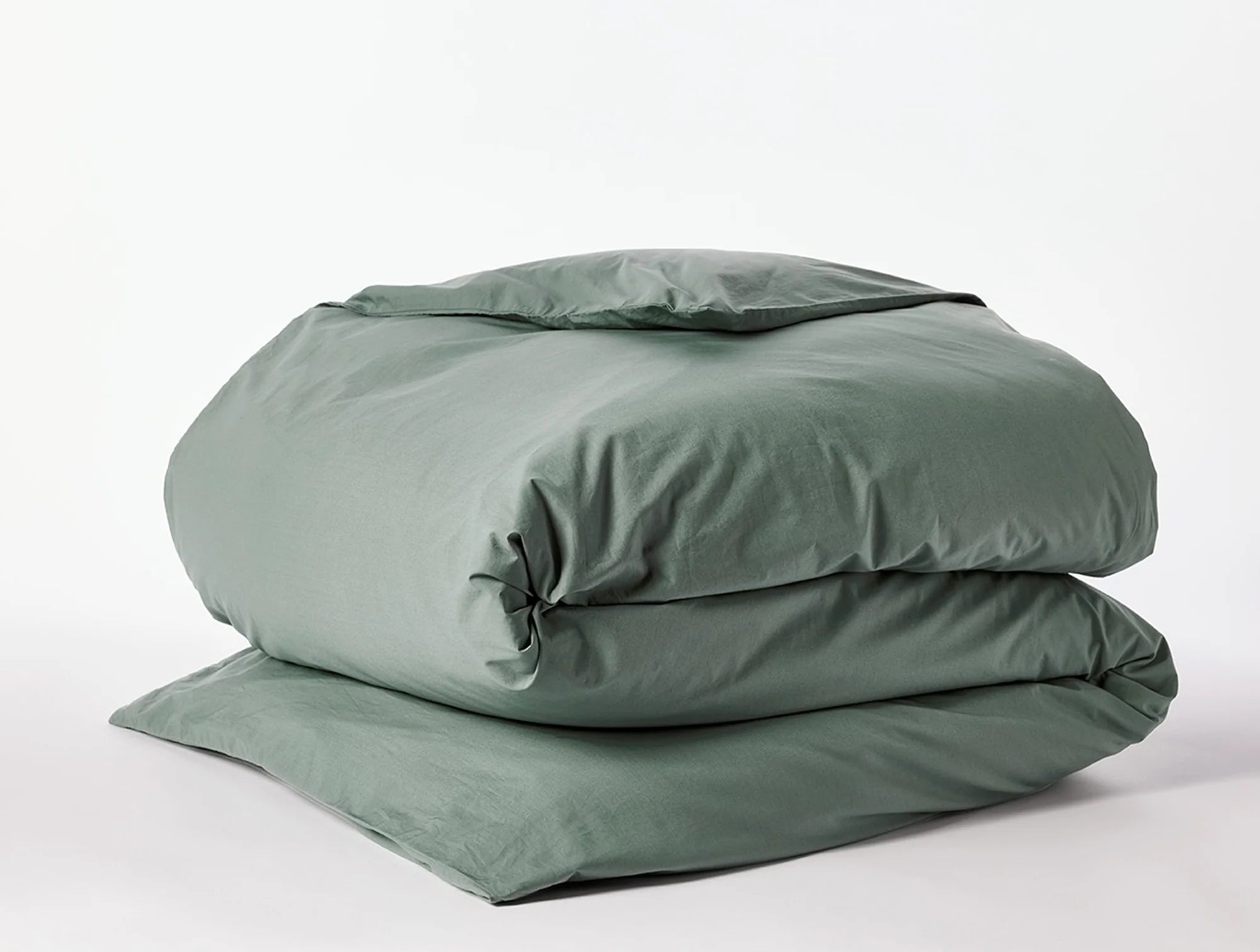 Coyuchi Organic Refined Percale Duvet Cover - folded #colour_juniper