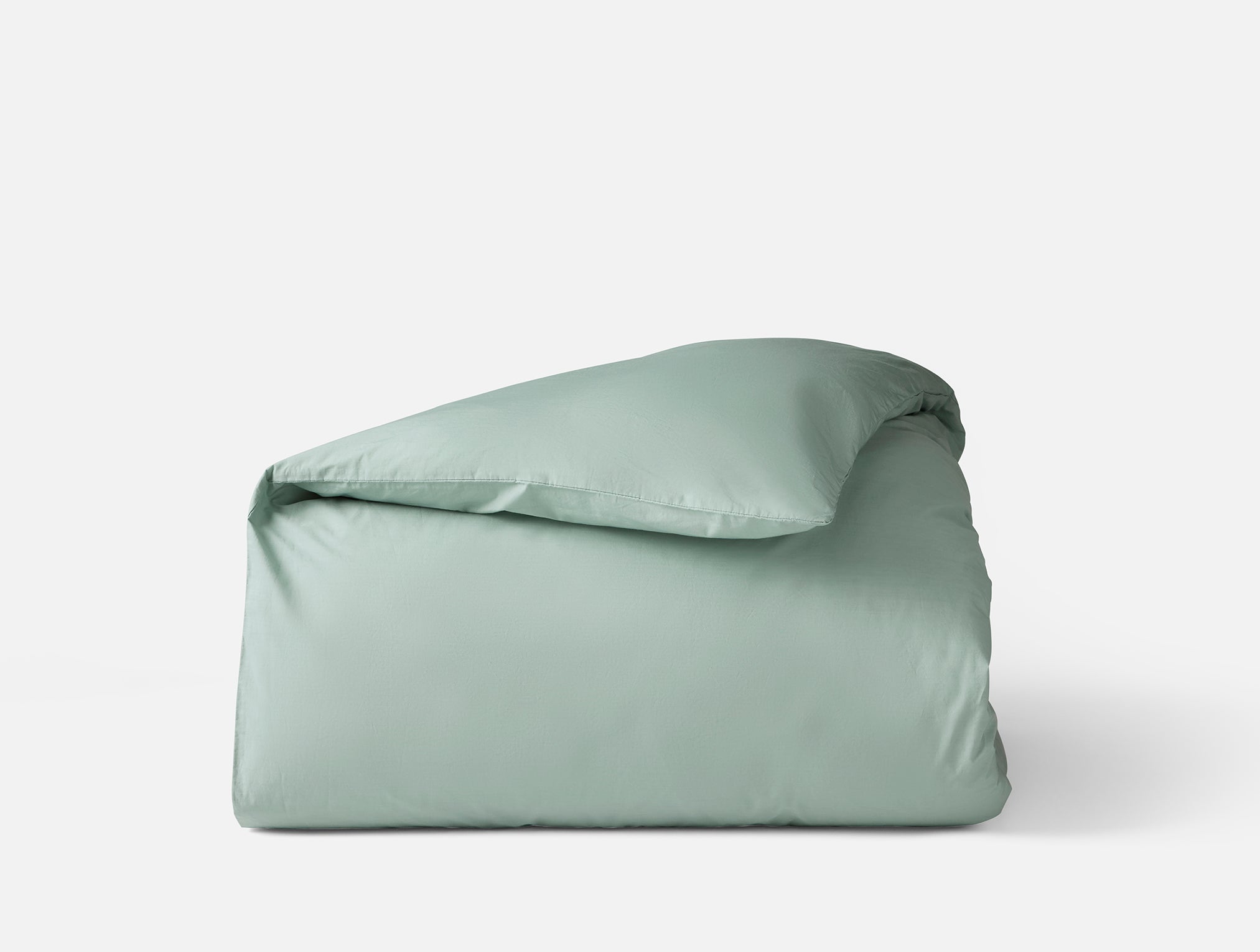 Coyuchi Organic Refined Percale Duvet Cover - folded #colour_seafoam