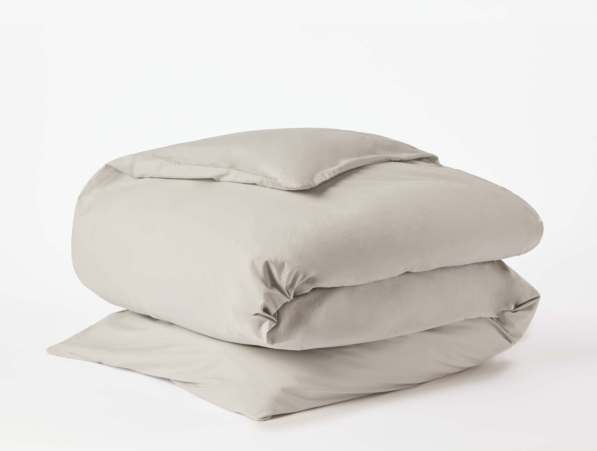 Coyuchi Organic Refined Percale Duvet Cover - folded #colour_stone