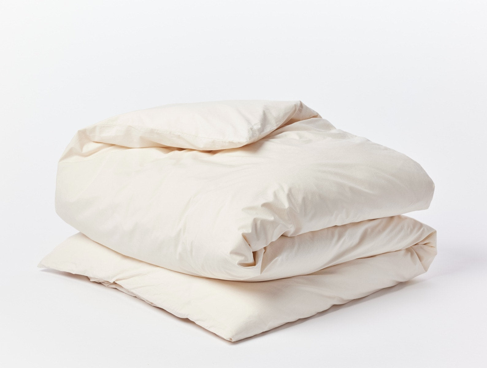 Coyuchi Organic Refined Percale Duvet Cover - folded #colour_undyed