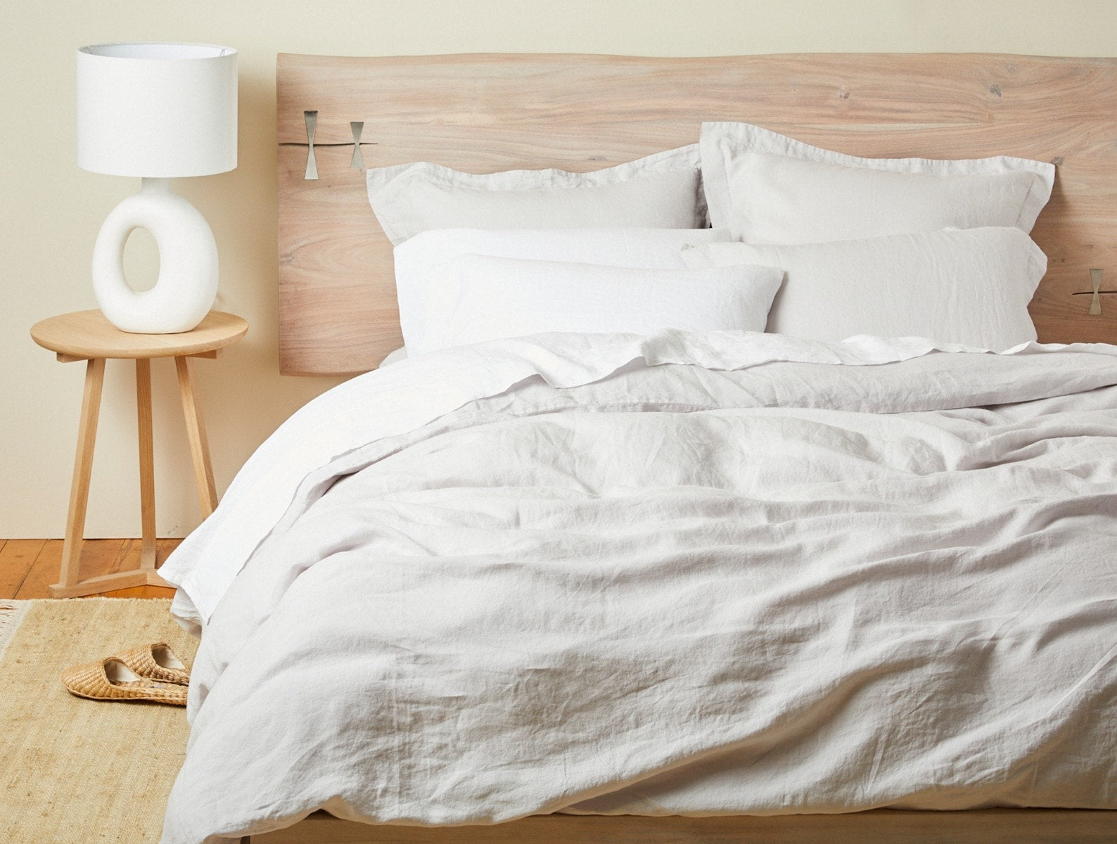 Coyuchi Organic Relaxed Linen Duvet Cover - staged bed with lamp #colour_fog