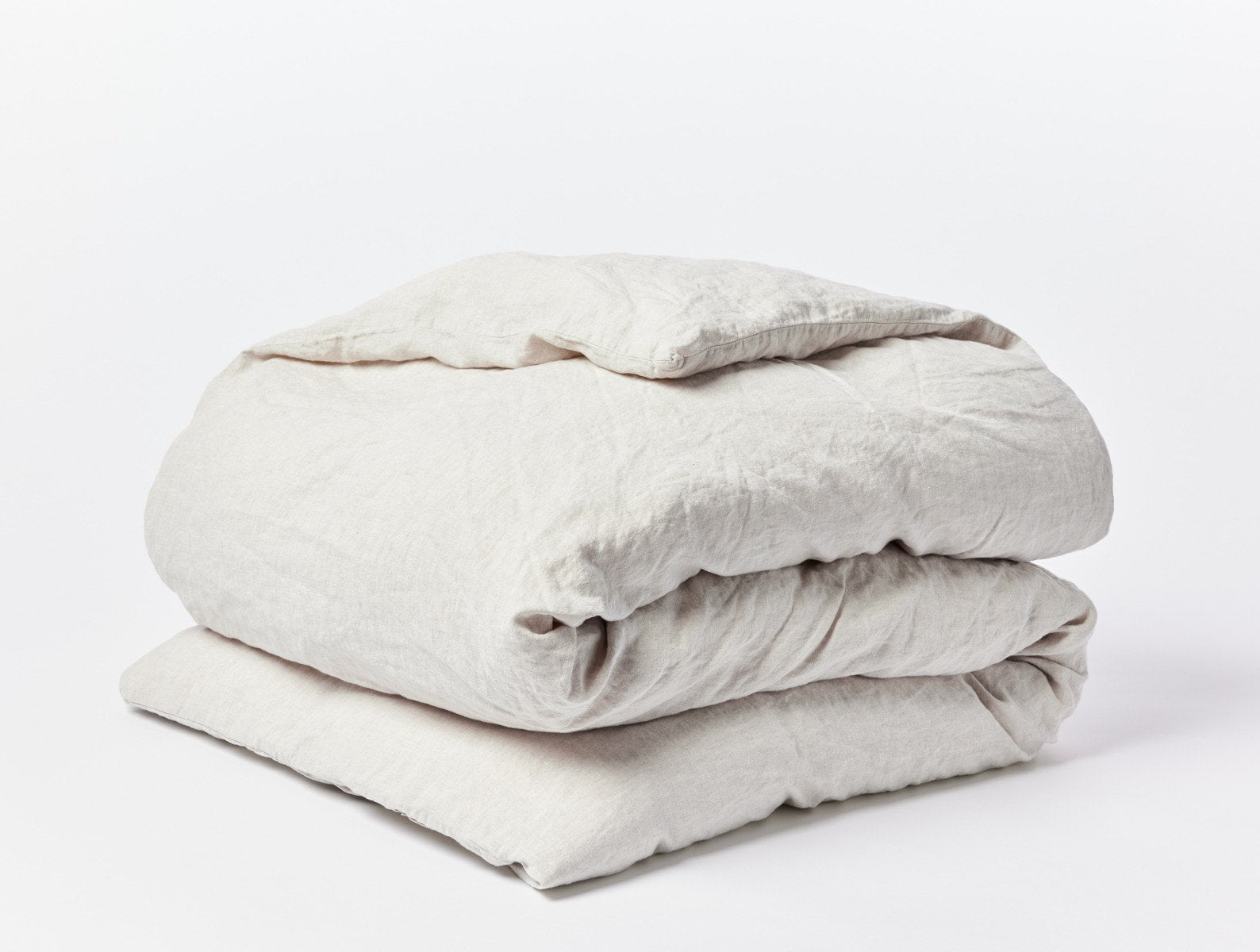 Coyuchi Organic Relaxed Linen Duvet Cover - folded #colour_natural chambray