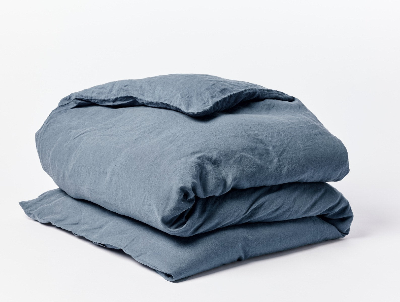Coyuchi Organic Relaxed Linen Duvet Cover - folded #colour_harbor blue