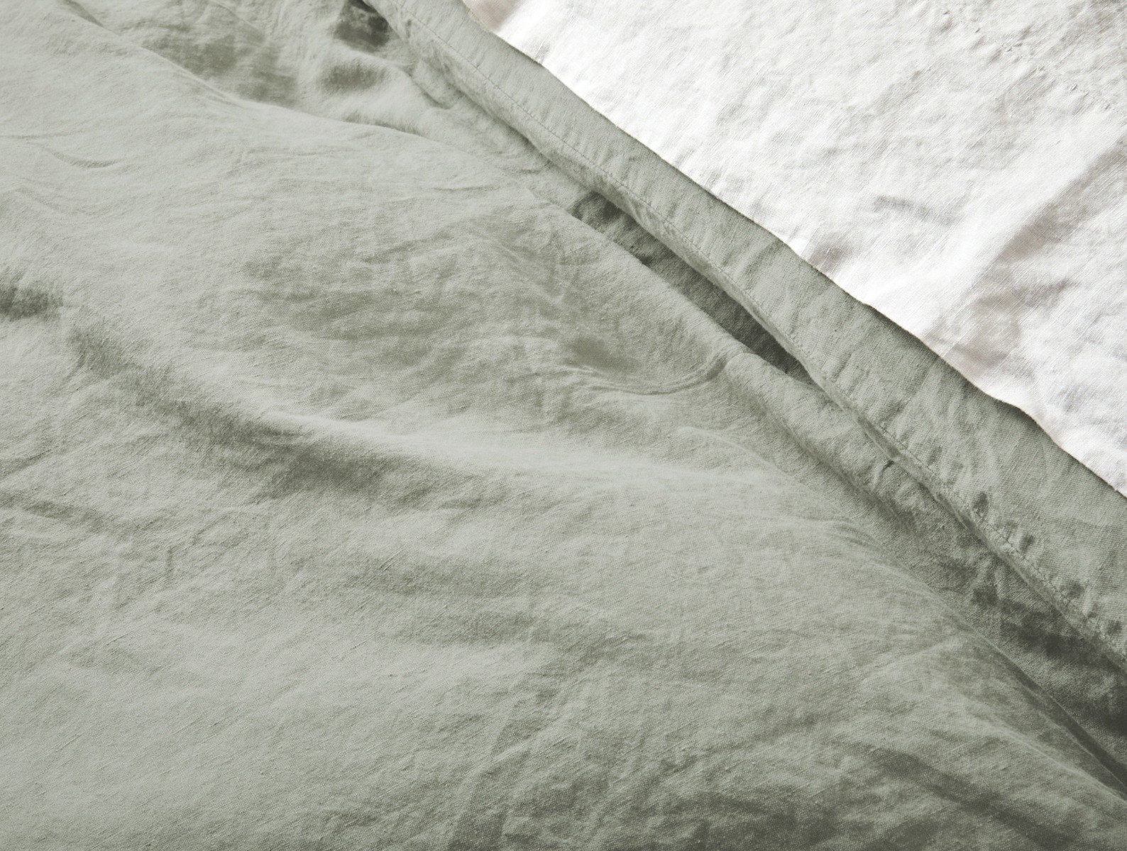 Coyuchi Organic Relaxed Linen Duvet Cover - close up #colour_laurel