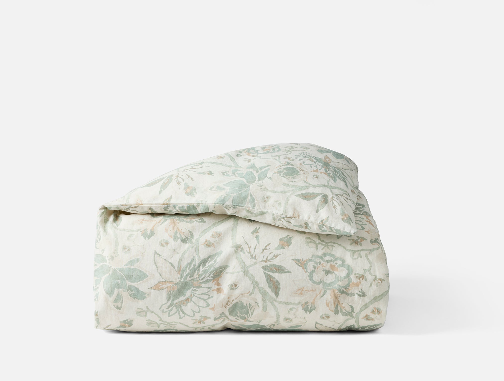 Coyuchi Organic Sea Bloom Print Duvet Cover - folded #colour_Natural w/Sage