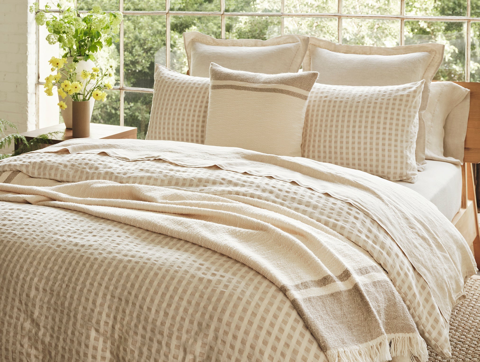 Coyuchi Organic Pampas Throw in Undyed with natural - made bed #colour_undyed w/natural