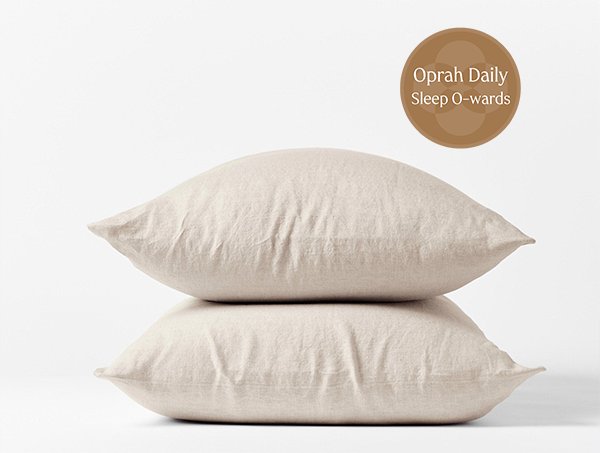 Coyuchi Organic Relaxed Linen Pillowcases in Natural Chambray –  two stacked pillows, showing pillowcase fit and linen texture. #colour_natural chambray