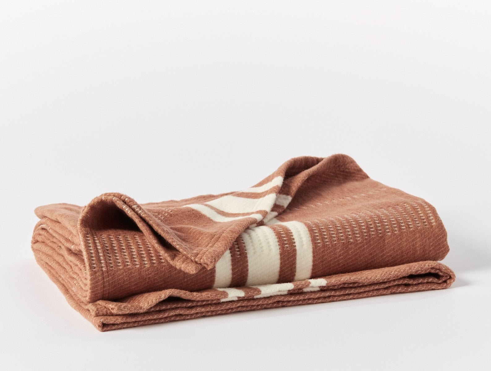Coyuchi Supersoft Organic Cotton Throw - folded #colour_spice