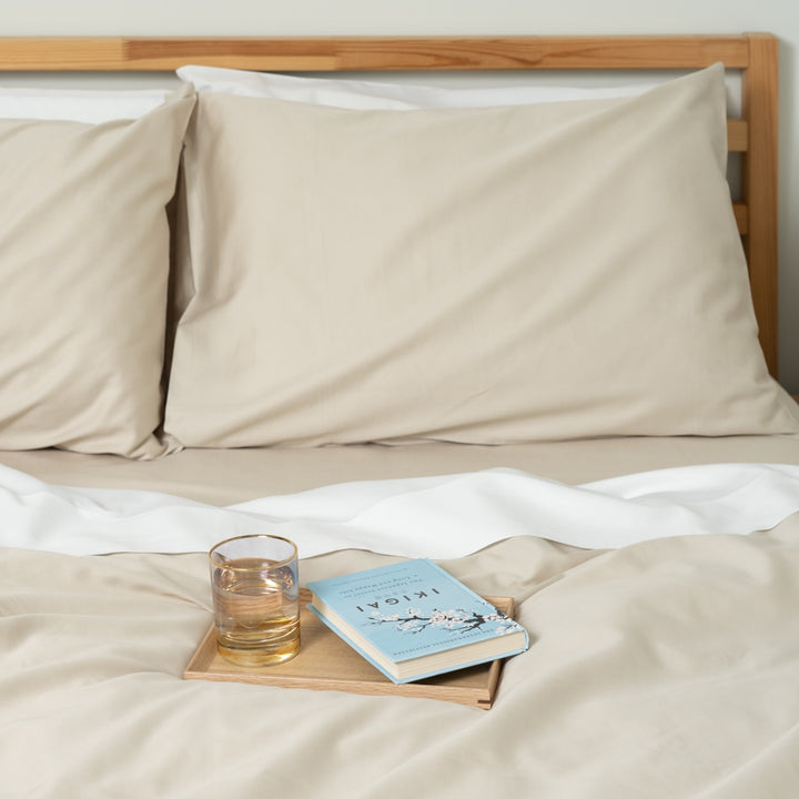 Homebird Organic Cotton Sateen Duvet Cover and Pillowcases - staged bed #colour_sand