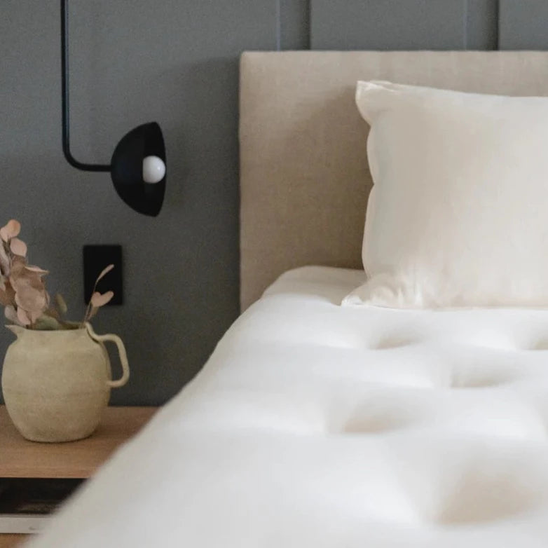 Obasan Deluxe Organic Latex Mattress - close up of headboard and side table 
