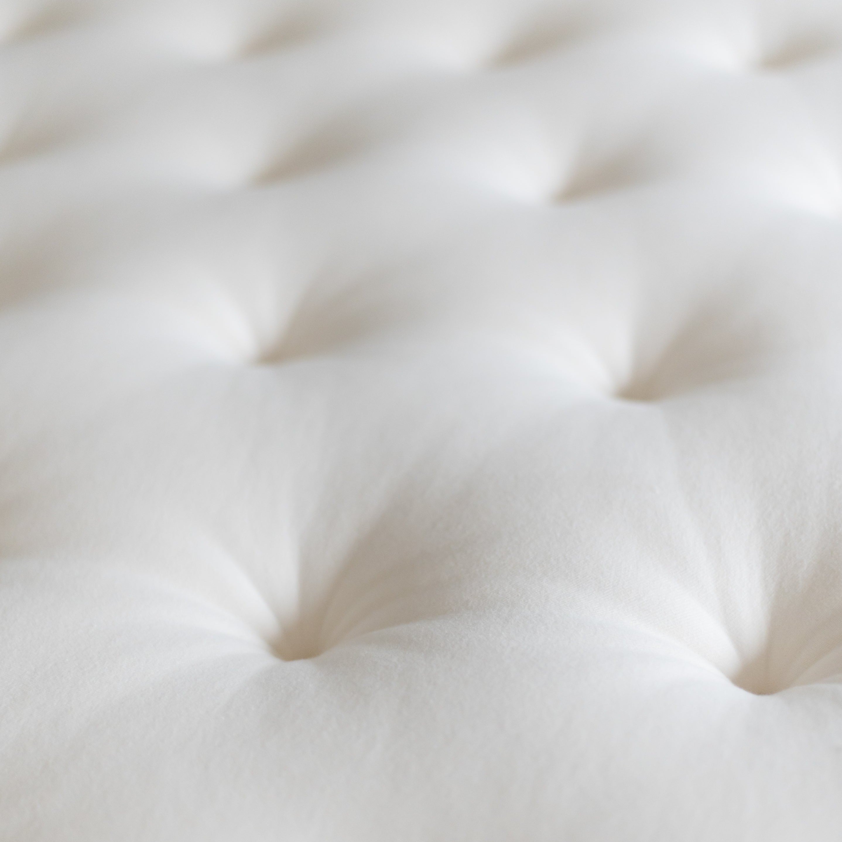 Obasan Organic Topper - close up of tufting