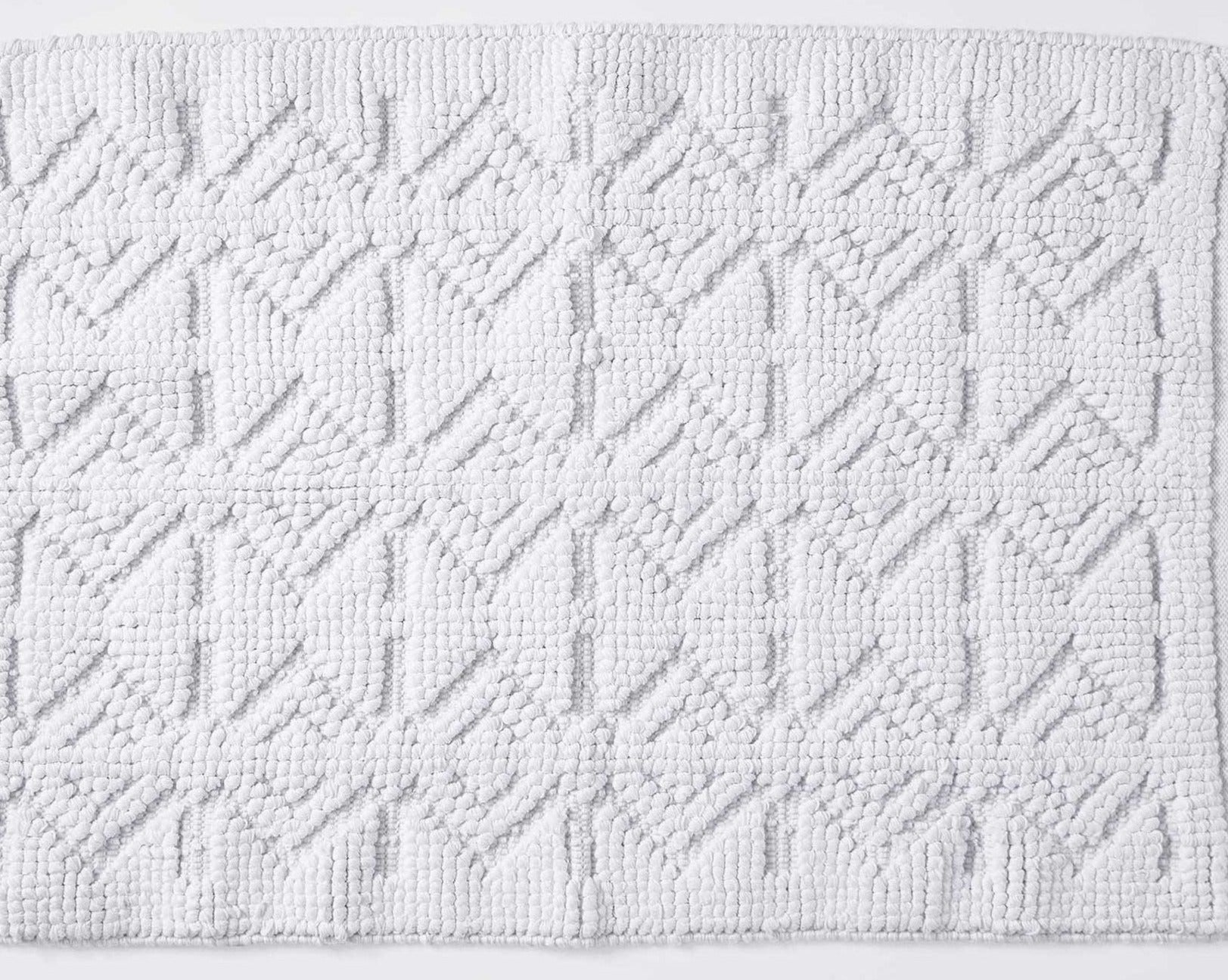 This bath rug is made from organic cotton and displays the subtle wonder of mineral tones.