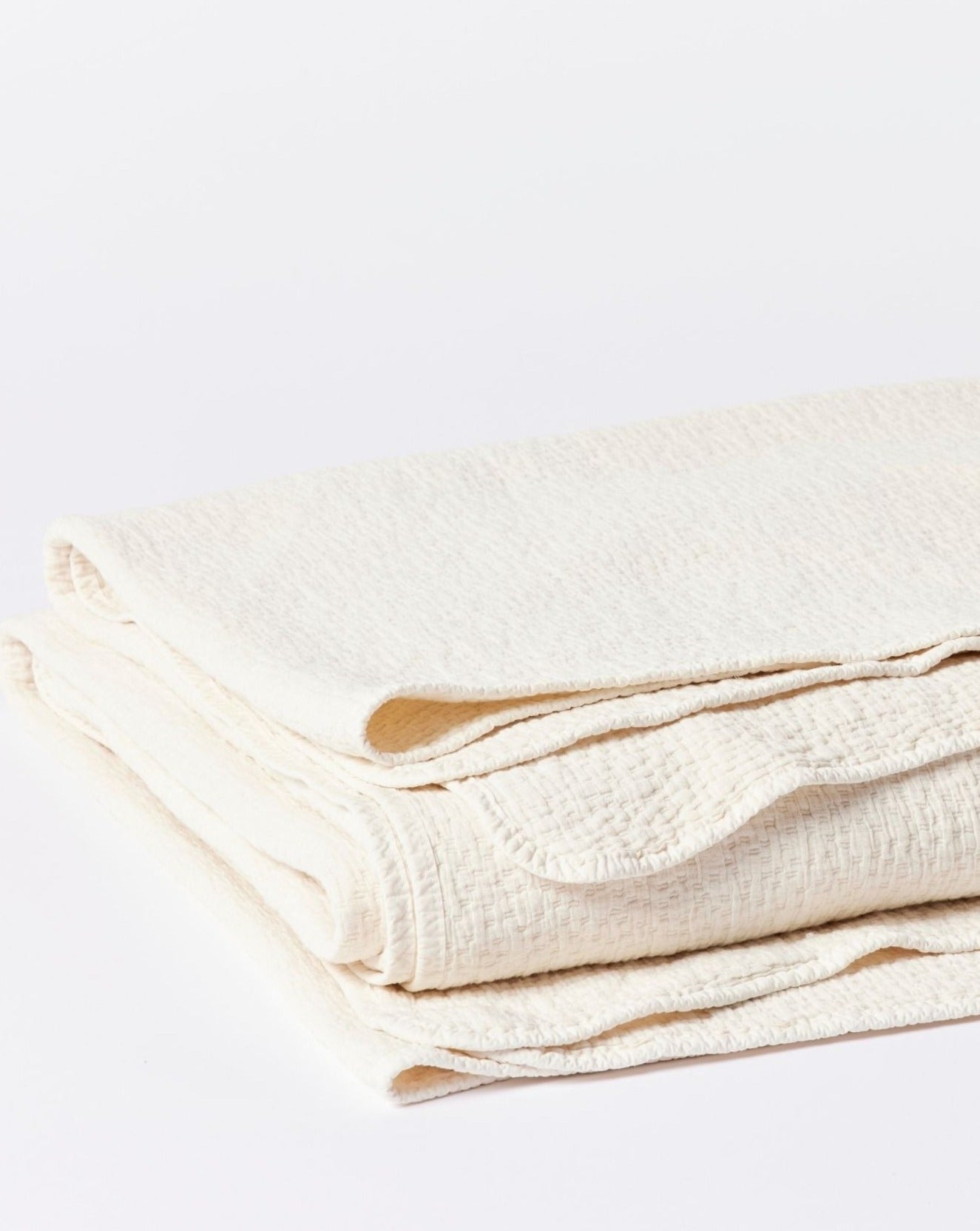 Coyuchi Organic Cascade Matelasse Blanket - folded #colour_Undyed