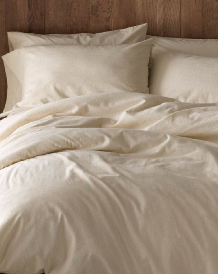 Coyuchi Organic Cloud Brushed Flannel Duvet Cover - staged bed focus on matching pillows #colour_undyed