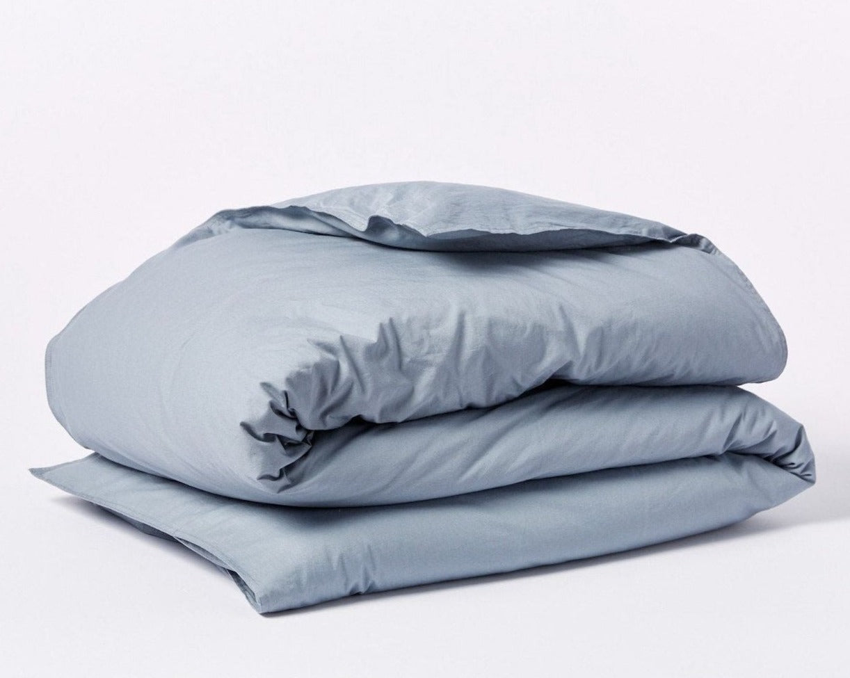 Coyuchi Organic Crinkled Percale Duvet Cover - folded #colour_Steel Blue