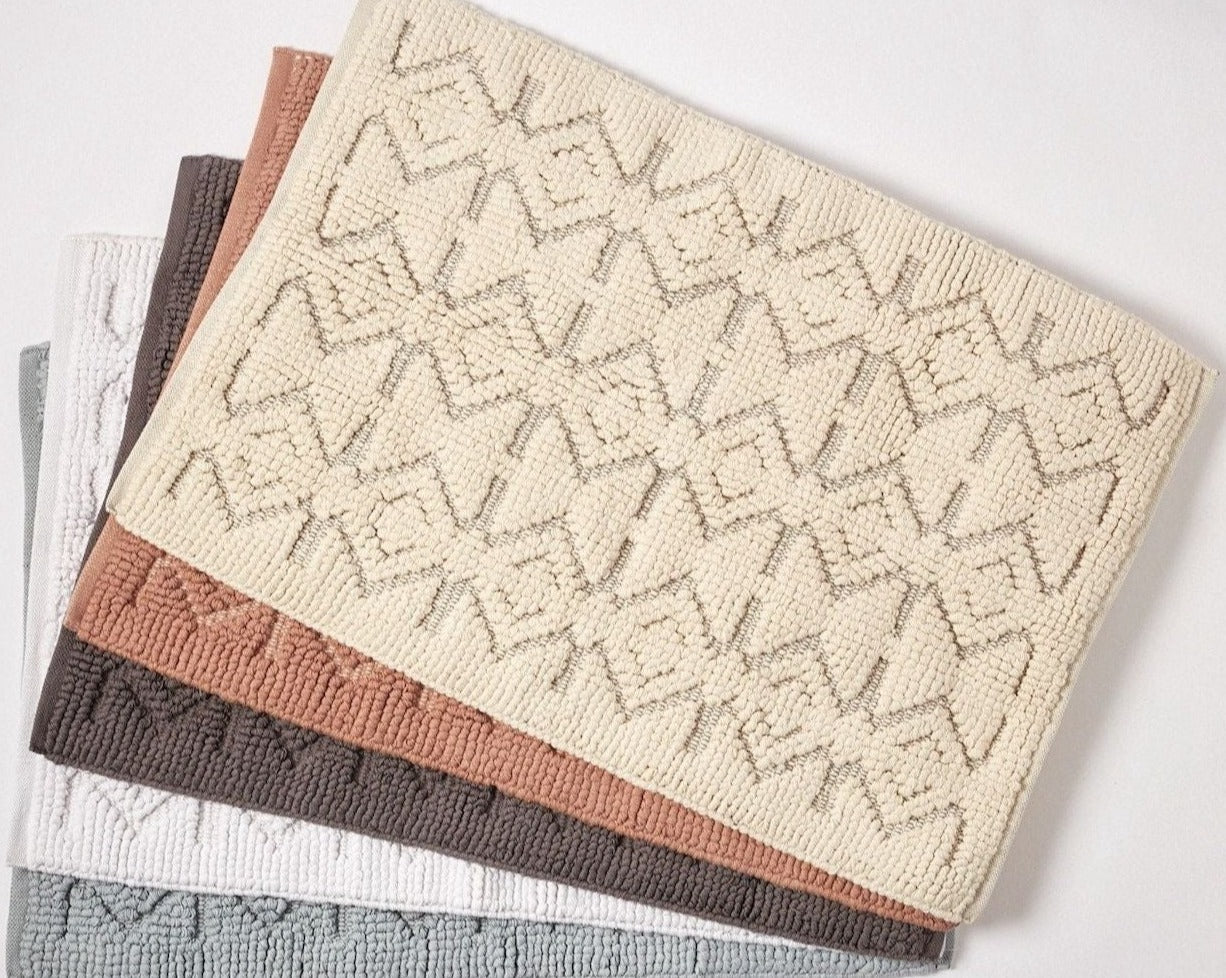 Coyuchi Organic Mosaic Canyon Bath Rug - colours fanned out #colour_