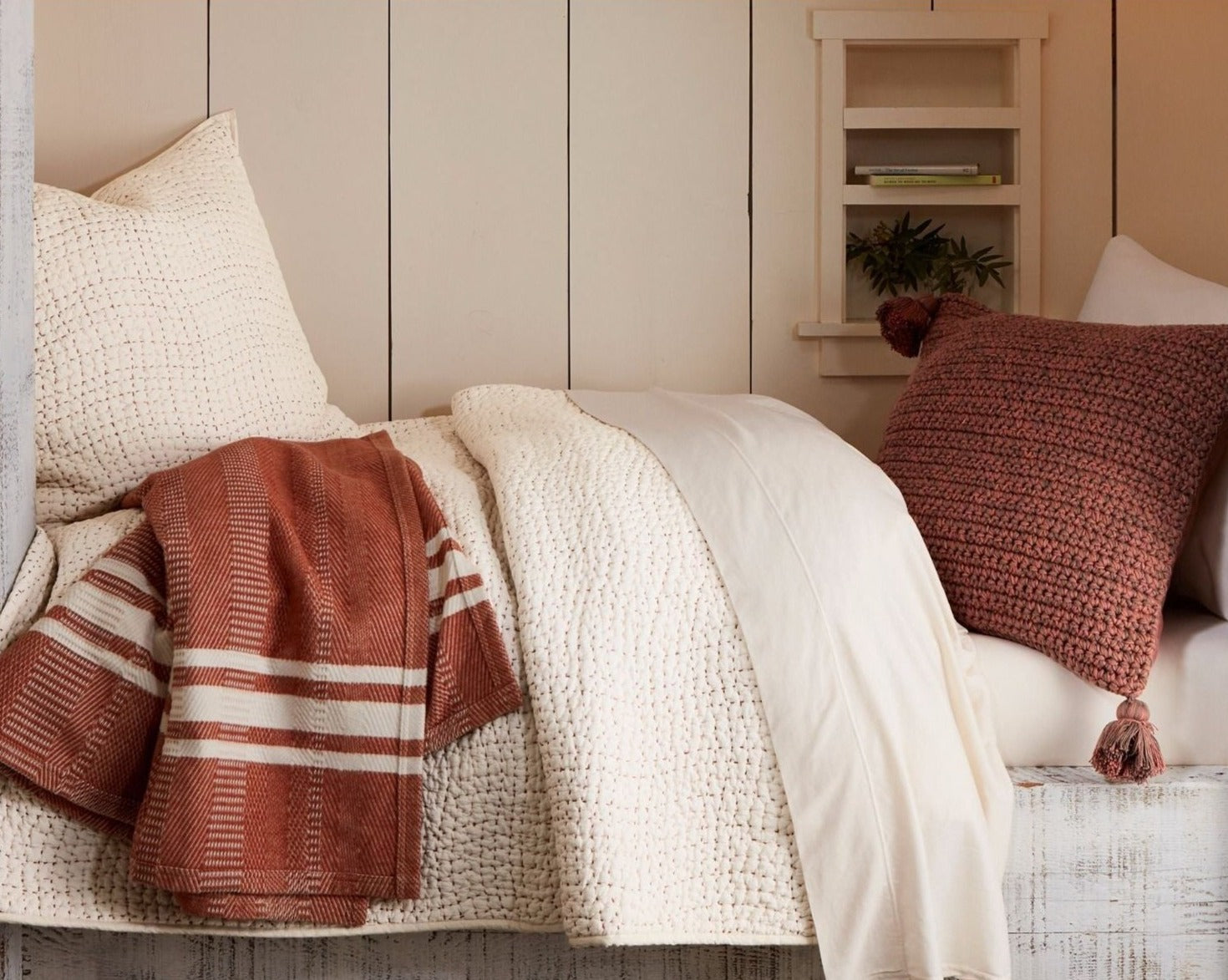 Coyuchi Organic Pebbled Hand Stitched Quilt - staged day bed contrasting pillows #colour_undyedd