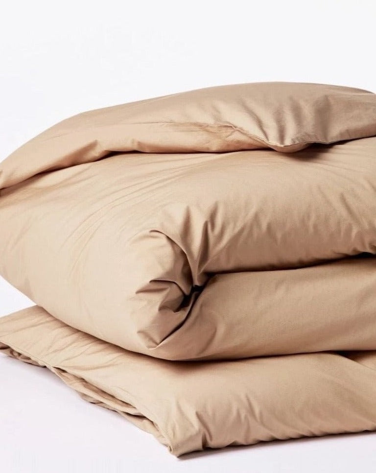 Coyuchi Organic Refined Percale Duvet Cover - folded #colour_fawn