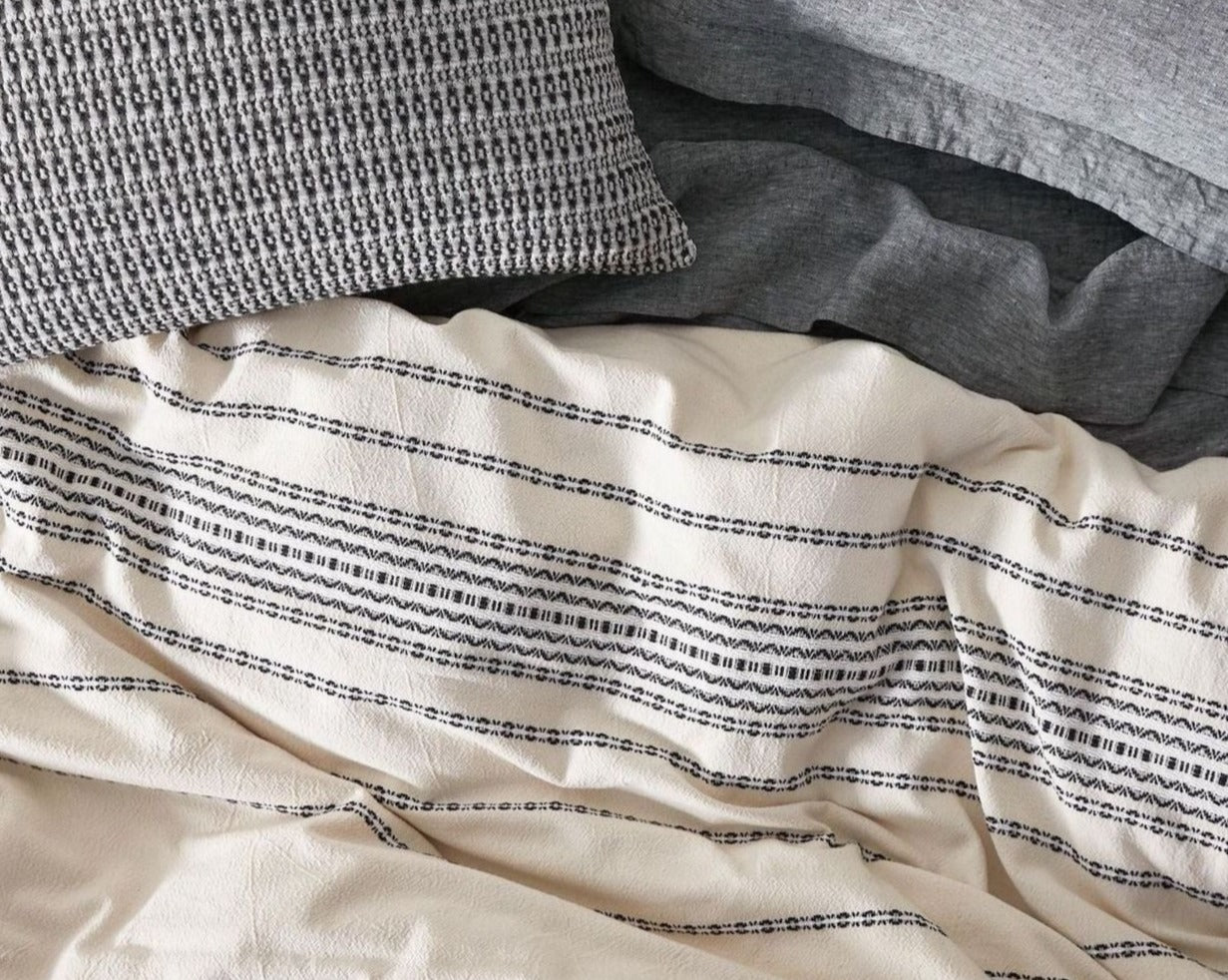 Coyuchi Organic Rippled Stripe Duvet Cover - top down with matching pillow #colour_ivory w/ black