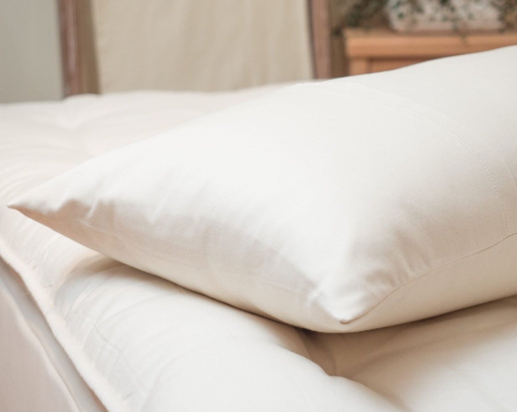 Kakun Organic Cotton Canvas Body Pillow Protector - pillow on mattress only showing end